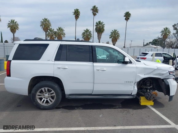 2016 Chevrolet Tahoe LS with VIN 1GNSCAKC1GR139869, listed as a IAAI auction lot 41642073 with 128,380 mi miles. Bid and sale history available at carsss.com. Image 14.