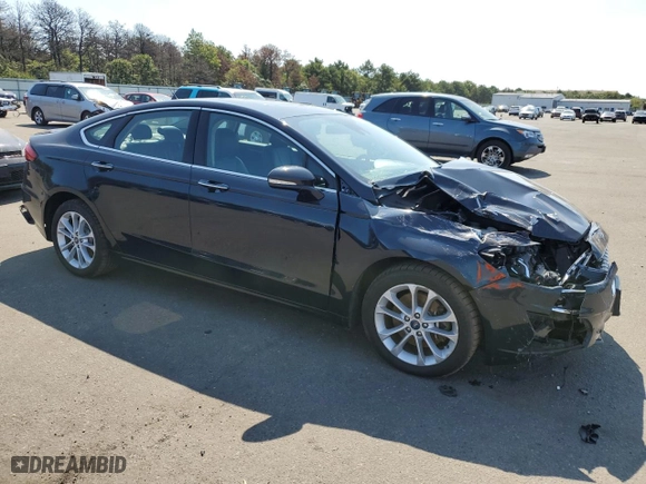 2020 Ford Fusion Plug-In Hybrid Titanium with VIN 3FA6P0SUXLR101997, listed as a Copart auction lot 69575324 with 74,121 mi miles and Salvage Title. Bid and sale history available at carsss.com. Image 4.