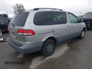 2002 Toyota Sienna CE with VIN 4T3ZF19C02U493816, listed as a IAAI auction lot 41813141 with 216,915 mi miles. Bid and sale history available at carsss.com. Image 4.
