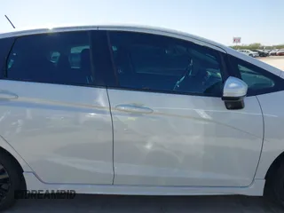 2018 Honda Fit Sport z VIN 3HGGK5H62JM732645, wystawiony jako IAAI lot #41216302 z przebiegiem 107 128 mil mil oraz . Historia ofert i sprzedaży dostępna na DreamBid. Obrazek 13.