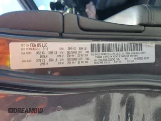 2018 Jeep Grand Cherokee Altitude with VIN 1C4RJFAG5JC320742, listed as a Copart auction lot 56988195 with 140,320 mi miles and Salvage title. Bid and sale history available at DreamBid. Image 13.