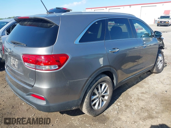 2017 Kia Sorento LX with VIN 5XYPGDA54HG306572, listed as a IAAI auction lot 42201527 with 74,815 mi miles and . Bid and sale history available at DreamBid. Image 4.