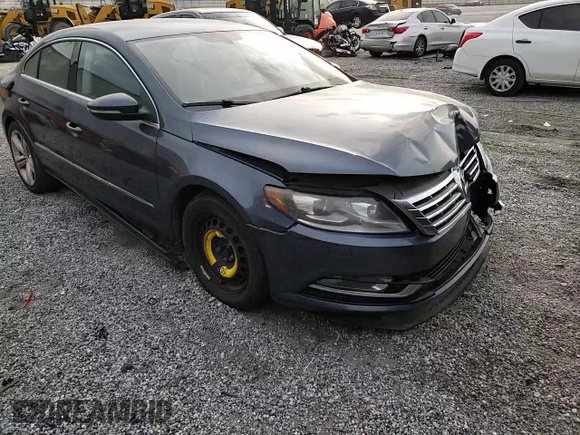 2013 Volkswagen CC Sport Plus z VIN WVWBP7AN0DE538178, wystawiony jako Copart lot #52394635 z przebiegiem 216 031 mil mil oraz Szkody całkowita. Historia ofert i sprzedaży dostępna na DreamBid. Obrazek 11.