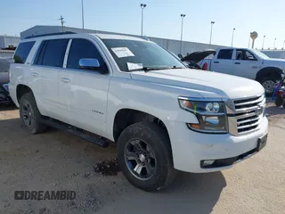 2019 Chevrolet Tahoe LT z VIN 1GNSKBKC3KR265748, wystawiony jako IAAI lot #41965982 z przebiegiem 182 006 mil mil oraz . Historia ofert i sprzedaży dostępna na DreamBid. Obrazek 1.
