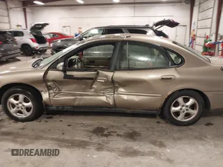 2003 Ford Taurus SES Standard with VIN 1FAFP552X3G184894, listed as a IAAI auction lot 41846677 with 160,824 mi miles. Bid and sale history available at carsss.com. Image 14.