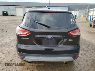 2013 Ford Escape SE with VIN 1FMCU9GX2DUB38657, listed as a Copart auction lot 63438765 with 124,142 mi miles and Clean title. Bid and sale history available at DreamBid. Image 6.