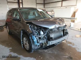2015 Honda CR-V EX with VIN 3CZRM3H57FG706605, listed as a IAAI auction lot 41233942 with 112,842 mi miles. Bid and sale history available at carsss.com. Image 1.