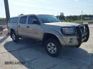 2007 Toyota Tacoma PreRunner z VIN 3TMJU62N87M040287, wystawiony jako IAAI lot #42375199 z przebiegiem 403 876 mil mil oraz . Historia ofert i sprzedaży dostępna na DreamBid. Obrazek 1.