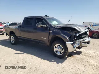 2021 Ram 2500 Tradesman with VIN 3C6UR5CJ0MG561557, listed as a Copart auction lot 50976935 with 98,567 mi miles and Salvage title. Bid and sale history available at DreamBid. Image 4.