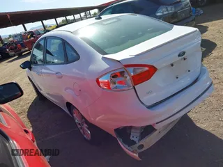 2014 Ford Fiesta SE with VIN 3FADP4BJ9EM133473, listed as a IAAI auction lot 42118460 with 107,705 mi miles and . Bid and sale history available at DreamBid. Image 3.