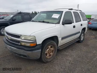 2004 Chevrolet Tahoe LT with VIN 1GNEK13T84J111012, listed as a IAAI auction lot 41662650 with 197,740 mi miles. Bid and sale history available at carsss.com. Image 2.