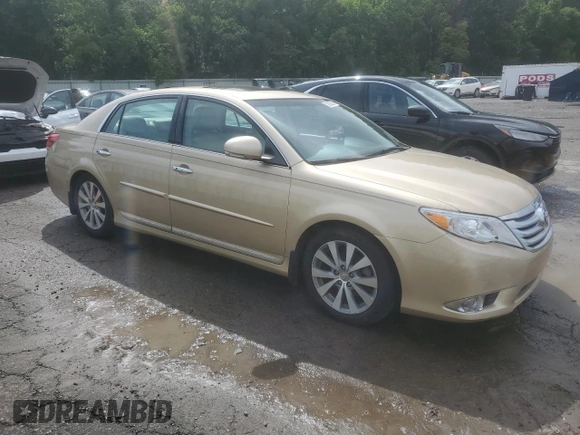 2011 Toyota Avalon with VIN 4T1BK3DBXBU412577, listed as a Copart auction lot 59008835 with 142,638 mi miles and Salvage title. Bid and sale history available at DreamBid. Image 4.