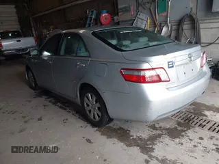 2007 Toyota Camry z VIN JTNBB46K973038138, wystawiony jako IAAI lot #42233680 z przebiegiem 230 480 mil mil oraz . Historia ofert i sprzedaży dostępna na DreamBid. Obrazek 3.
