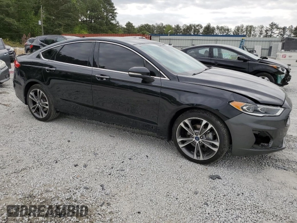 2019 Ford Fusion Titanium with VIN 3FA6P0D95KR184147, listed as a Copart auction lot 52968885 with 122,170 mi miles and Clean Title. Bid and sale history available at carsss.com. Image 4.