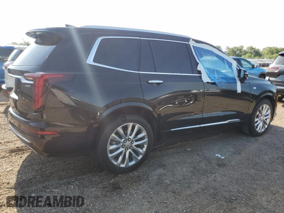 2020 Cadillac XT6 FWD Premium Luxury с VIN 1GYKPCRSXLZ174002, выставлен на аукционе Copart как лот 52083235 с пробегом 79 712 миль миль и Списание • Salvage title. История ставок и продаж доступна на DreamBid. Изображение 3.