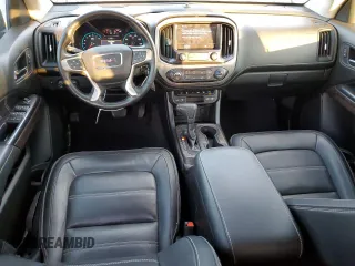 2021 GMC Canyon 4WD Denali with VIN 1GTG6EEN4M1130779, listed as a Copart auction lot 82695044 with 38,662 mi miles and Salvage Title. Bid and sale history available at carsss.com. Image 8.