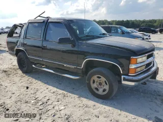 1999 Chevrolet Tahoe Z71 with VIN 1GNEK13R1XJ380316, listed as a Copart auction lot 68505524 with 242,542 mi miles and Salvage Title. Bid and sale history available at carsss.com. Image 4.