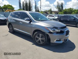 2019 Infiniti QX60 Pure with VIN 5N1DL0MN5KC560950, listed as a Copart auction lot 61051805 with 55,857 mi miles and Salvage title. Bid and sale history available at DreamBid. Image 4.
