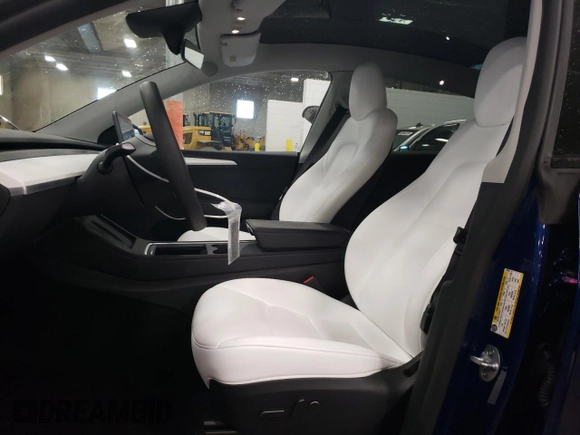 2023 Tesla Model Y Long Range with VIN 7SAYGDEE7PA180793, listed as a Copart auction lot 46706855 with 18,136 mi miles and Non Repairable. Bid and sale history available at DreamBid. Image 7.