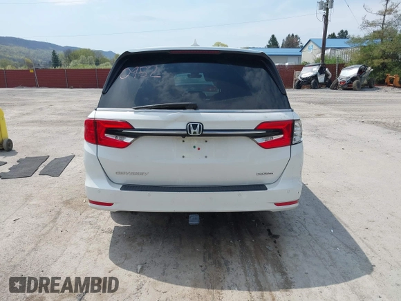 2021 Honda Odyssey Touring with VIN 5FNRL6H80MB010952, listed as a IAAI auction lot 42080412 with 90,594 mi miles and . Bid and sale history available at DreamBid. Image 16.