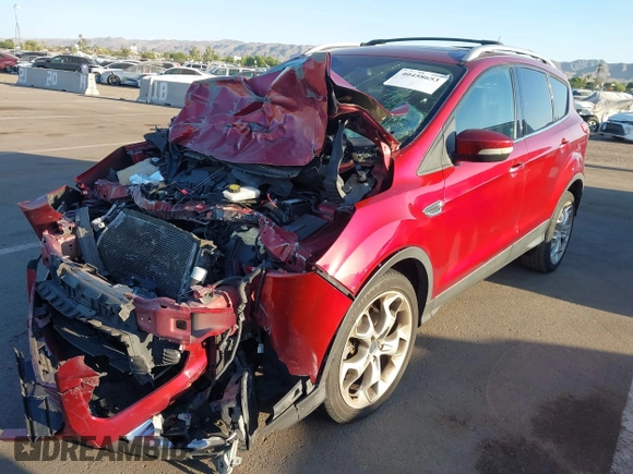 2013 Ford Escape Titanium with VIN 1FMCU0J96DUA57425, listed as a IAAI auction lot 40458653 with 121,929 mi miles. Bid and sale history available at carsss.com. Image 2.