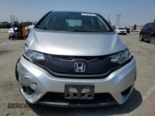2015 Honda Fit LX with VIN 3HGGK5H55FM748370, listed as a Copart auction lot 61524455 with 87,235 mi miles and Salvage title. Bid and sale history available at DreamBid. Image 5.