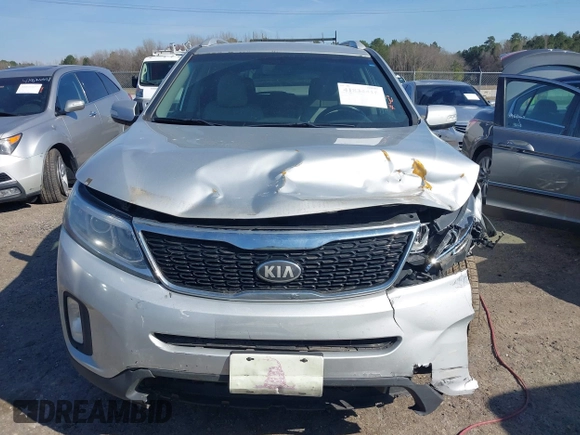2014 Kia Sorento LX z VIN 5XYKT3A69EG437937, wystawiony jako IAAI lot #41834416 z przebiegiem 208 671 mil mil oraz . Historia ofert i sprzedaży dostępna na DreamBid. Obrazek 13.