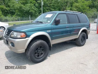 2004 Mitsubishi Montero XLS z VIN JA4MT31R34J007557, wystawiony jako IAAI lot #42368032 z przebiegiem 172 104 mil mil oraz . Historia ofert i sprzedaży dostępna na DreamBid. Obrazek 2.