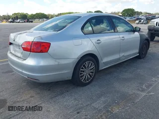 2013 Volkswagen Jetta Sedan S with VIN 3VW2K7AJ3DM367526, listed as a IAAI auction lot 41595691 with 113,503 mi miles. Bid and sale history available at carsss.com. Image 4.