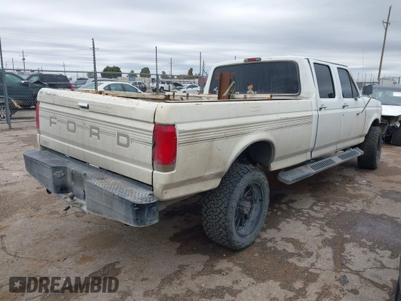 1995 Ford F-350 with VIN 1FTJW36H0SEA10003, listed as a IAAI auction lot 41959728 with 266,377 mi miles and . Bid and sale history available at DreamBid. Image 4.