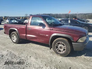 2002 Dodge Dakota with VIN 1B7FL16X62S694633, listed as a Copart auction lot 86515034 with 270,483 mi miles and Salvage Title. Bid and sale history available at carsss.com. Image 4.