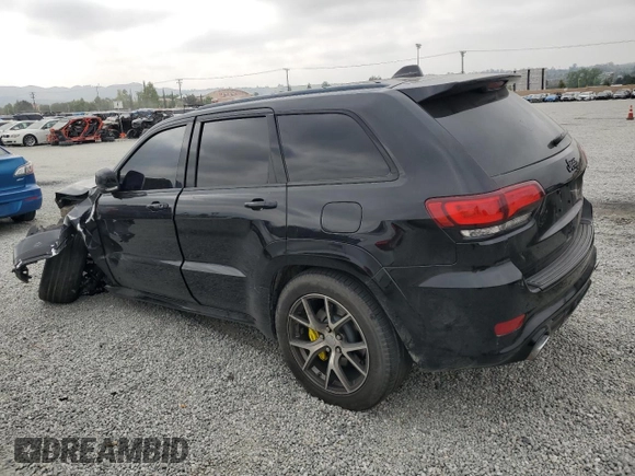 2017 Jeep Grand Cherokee SRT with VIN 1C4RJFDJ1HC904654, listed as a Copart auction lot 55954124 with 82,507 mi miles and Salvage Title. Bid and sale history available at carsss.com. Image 2.
