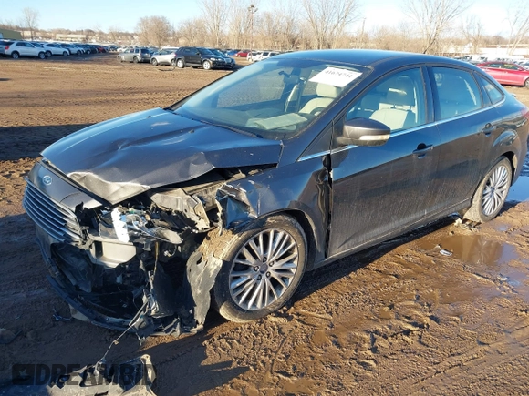 2015 Ford Focus Titanium with VIN 1FADP3J28FL348625, listed as a IAAI auction lot 41674741 with 223,585 mi miles and . Bid and sale history available at carsss.com. Image 2.