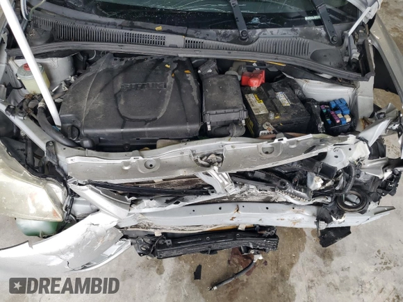 2012 Suzuki SX4 LE z VIN JS2YC5A34C6304150, wystawiony jako Copart lot #48629255 z przebiegiem 104 658 mil mil oraz Szkoda całkowita • Salvage title. Historia ofert i sprzedaży dostępna na DreamBid. Obrazek 12.