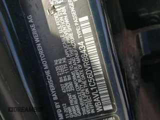 2013 BMW X1 xDrive28i with VIN WBAVL1C56DVR88434, listed as a Copart auction lot 52126925 with 136,187 mi miles and Salvage Title. Bid and sale history available at carsss.com. Image 12.