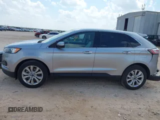 2022 Ford Edge Titanium with VIN 2FMPK4K99NBB06136, listed as a IAAI auction lot 42733977 with 57,794 mi miles and . Bid and sale history available at DreamBid. Image 14.
