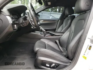 2018 BMW 5 Series 530i with VIN WBAJA5C53JG898430, listed as a Copart auction lot 54243195 with 129,854 mi miles and Salvage title. Bid and sale history available at DreamBid. Image 7.