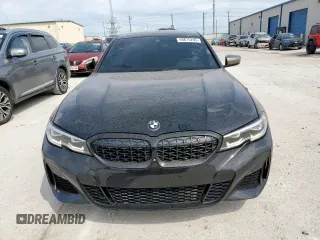 2020 BMW 3 Series M340i xDrive with VIN WBA5U9C04LA380918, listed as a Copart auction lot 48875295 with 72,540 mi miles and Salvage Title. Bid and sale history available at DreamBid. Image 5.