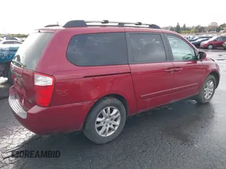 2006 Kia Sedona LX with VIN KNDMB233X66030979, listed as a IAAI auction lot 41933430 with 127,305 mi miles and . Bid and sale history available at DreamBid. Image 4.