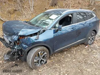 2023 Kia Sportage Hybrid EX with VIN KNDPVCAG3P7057632, listed as a IAAI auction lot 41816555 with 27,849 mi miles. Bid and sale history available at carsss.com. Image 2.