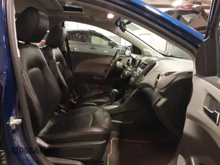 2012 Chevrolet Sonic LTZ z VIN 1G1JE5SB4C4214450, wystawiony jako IAAI lot #42207345 z przebiegiem 120 152 mil mil oraz . Historia ofert i sprzedaży dostępna na DreamBid. Obrazek 5.