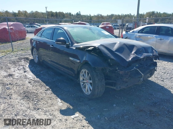 2013 Jaguar XJ Portfolio z VIN SAJWJ2GD9D8V46641, wystawiony jako IAAI lot #41817267 z przebiegiem Nie podano mil oraz . Historia ofert i sprzedaży dostępna na DreamBid. Obrazek 1.