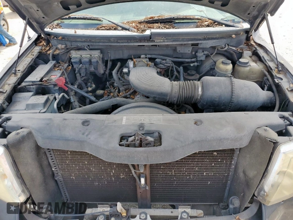2005 Ford F-150 XLT с VIN 1FTRW12W45KC60877, выставлен на аукционе Copart как лот 58039515 с пробегом Не указан миль и Списание • Salvage title. История ставок и продаж доступна на DreamBid. Изображение 11.