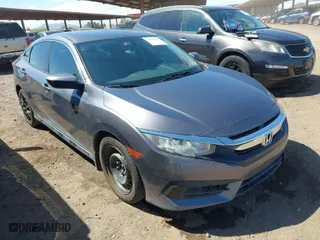 2017 Honda Civic Sedan LX with VIN 19XFC2F52HE065998, listed as a IAAI auction lot 41718165 with 112,292 mi miles. Bid and sale history available at carsss.com. Image 1.