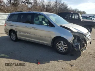 2006 Honda Odyssey EX-L with VIN 5FNRL38666B459794, listed as a Copart auction lot 46605245 with 106,623 mi miles and Salvage Title. Bid and sale history available at carsss.com. Image 4.