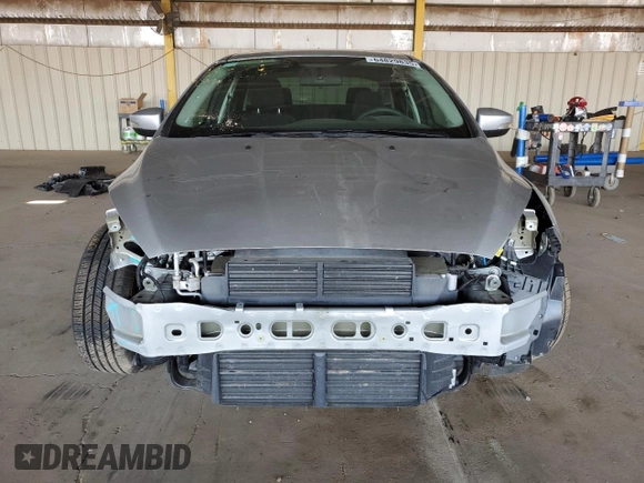 2015 Ford Focus SE with VIN 1FADP3F20FL232196, listed as a Copart auction lot 64829835 with 31,294 mi miles and Salvage title. Bid and sale history available at DreamBid. Image 5.