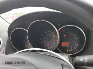 2006 Mazda 3 i Touring with VIN JM1BK32G761490132, listed as a Copart auction lot 52937645 with 146,299 mi miles and Salvage Title. Bid and sale history available at DreamBid. Image 9.