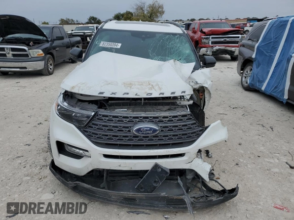 2023 Ford Explorer XLT with VIN 1FMSK7DH0PGA74849, listed as a Copart auction lot 82350204 with 22,213 mi miles and Salvage Title. Bid and sale history available at carsss.com. Image 5.