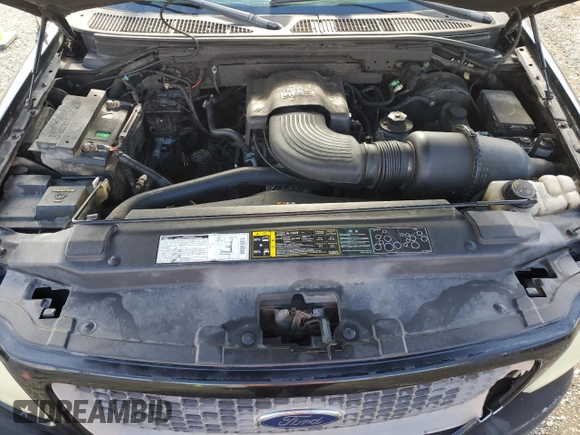 2001 Ford F-150 XL with VIN 1FTRX17W91NB71630, listed as a Copart auction lot 56583545 with 209,009 mi miles and Salvage title. Bid and sale history available at DreamBid. Image 11.