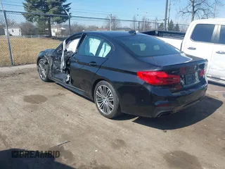 2019 BMW 5 Series M550i xDrive with VIN WBAJB9C51KB464879, listed as a IAAI auction lot 41774834 with 77,379 mi miles and . Bid and sale history available at DreamBid. Image 3.